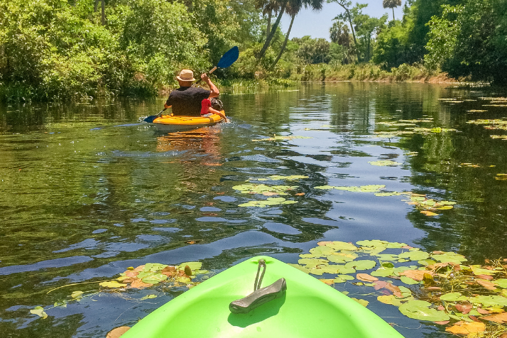 a man in a kayak is what to bring tubing on the river 