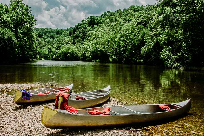 canoes on the bank of the black river mo