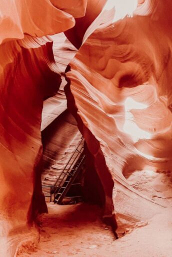 A staircase inside of Lower Antelope Canyon. Lower Antelope Canyon vs upper antelope canyon has ladders and stairs.