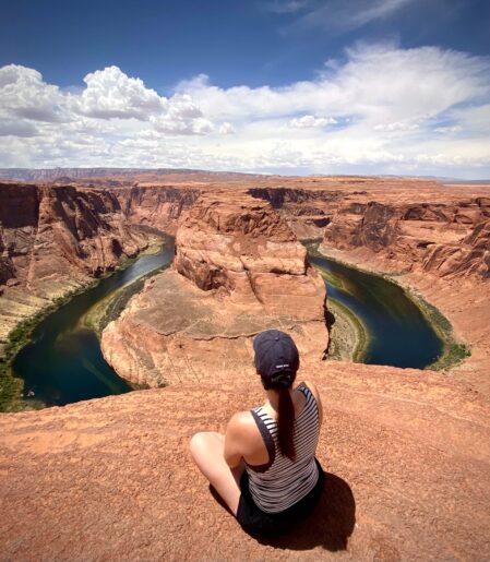 Women sitting and looking at the view of Horseshoe Bend