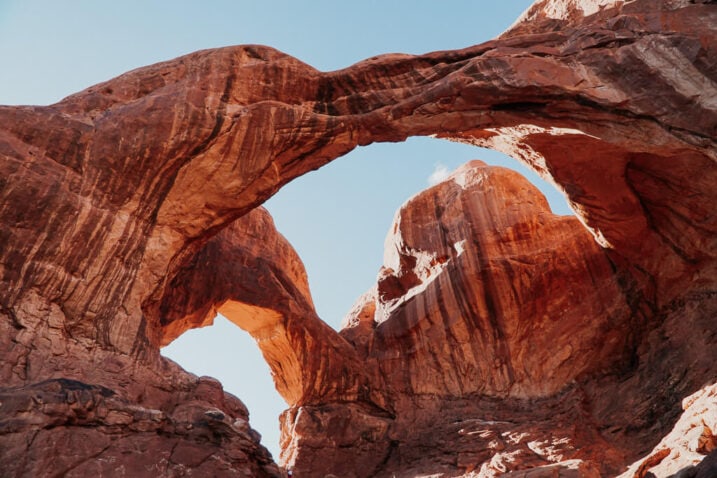 Double Arch is a very large arch on a hiking trail in Arches National Park