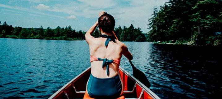 Find out which river float trip is the best for you quiz cover photo of a women in a canoe