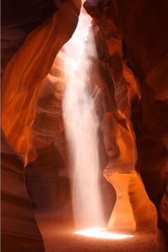 light beam shining down from the ceiling inside the famous upper antelope canyon slot canyon
