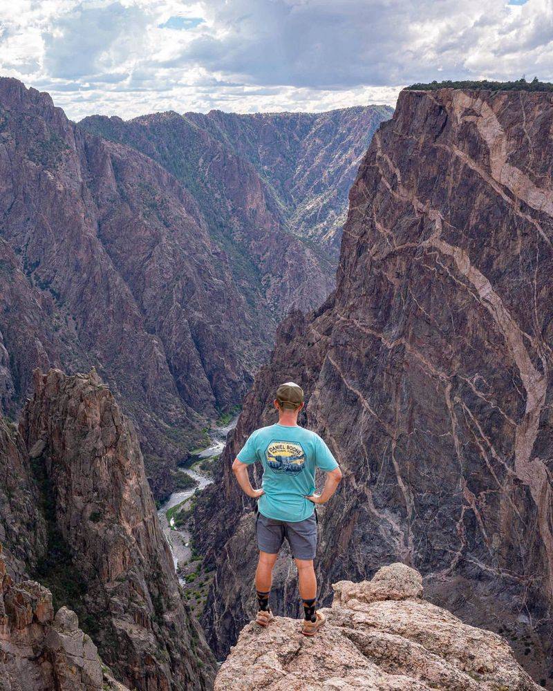 Standing Before Colorado's Tallest Cliff Face