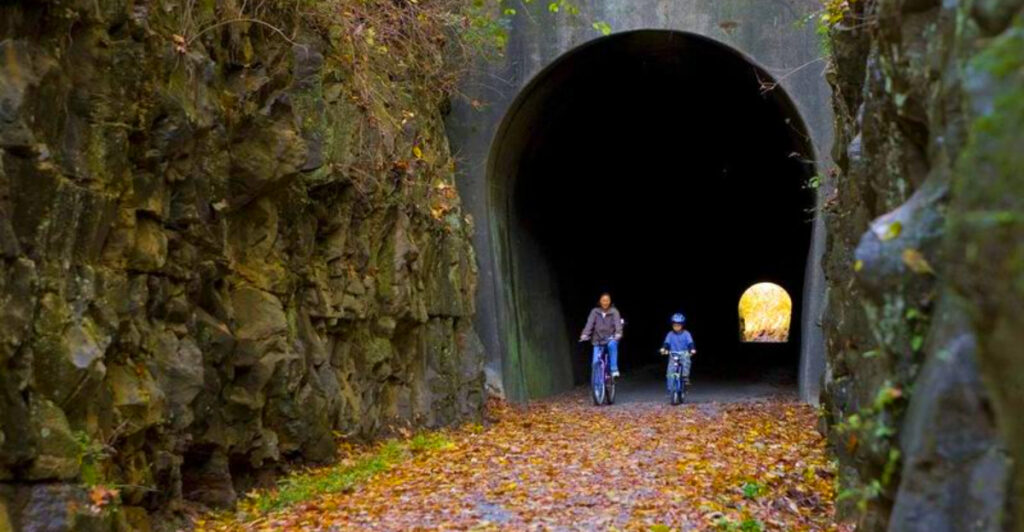 Bike These 10 Tunnel-Filled Rail-Trails for Epic Bridges, Gorges and Valley Views