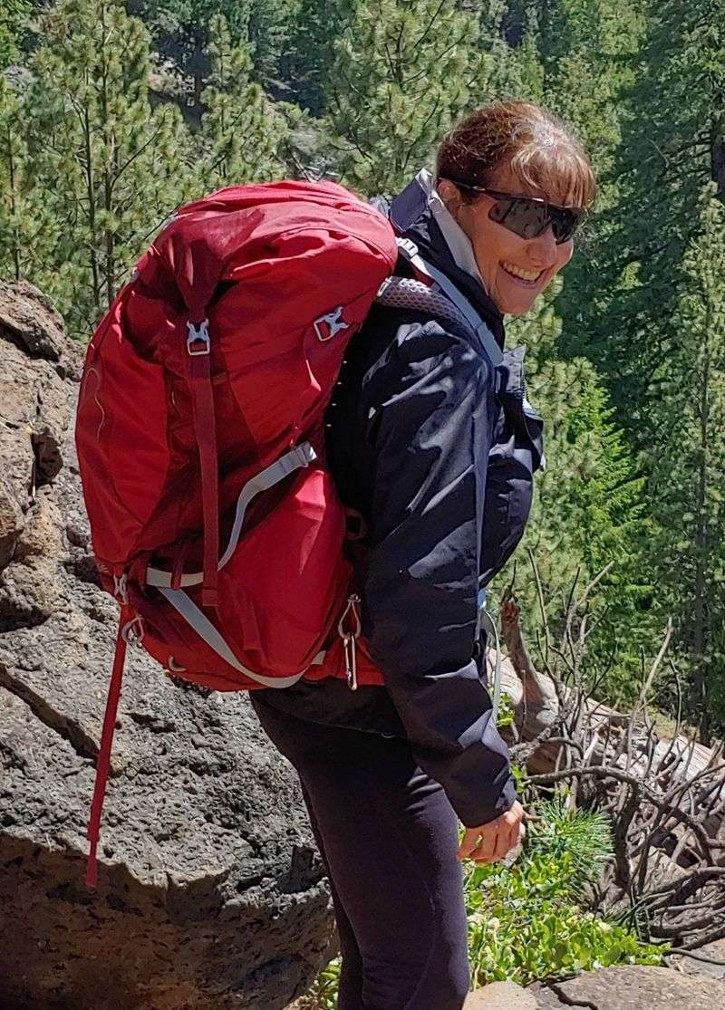 A light 15–20L daypack (less bulk, enough room)