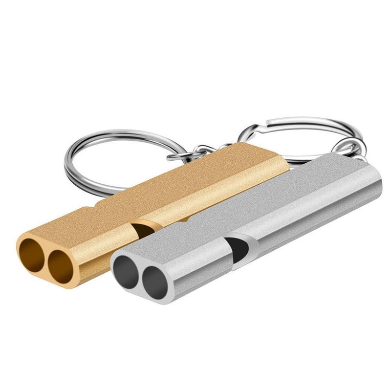Loud rescue whistle on your pack strap