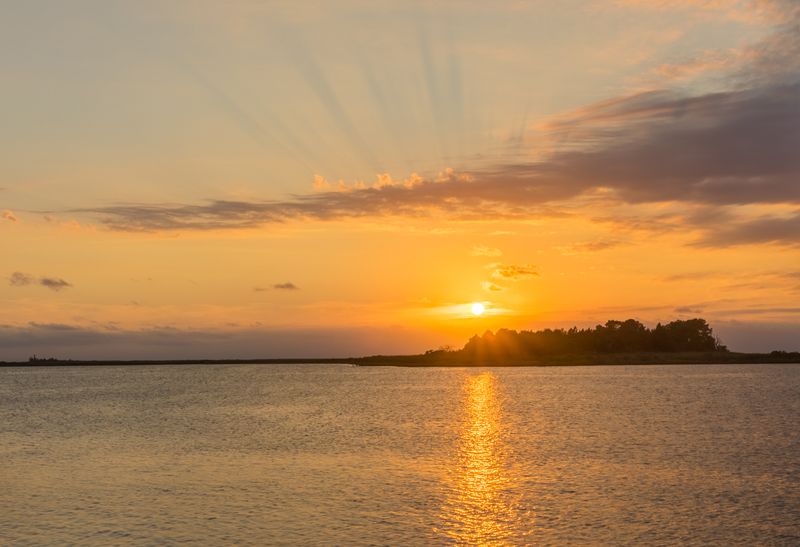 Enjoy Spectacular Waterfront Sunsets Over the Bay