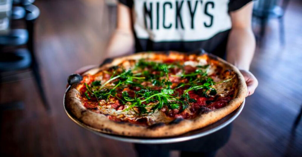 10 Tennessee Pizza Spots Serving Slices with the Ultimate Cheese Pull