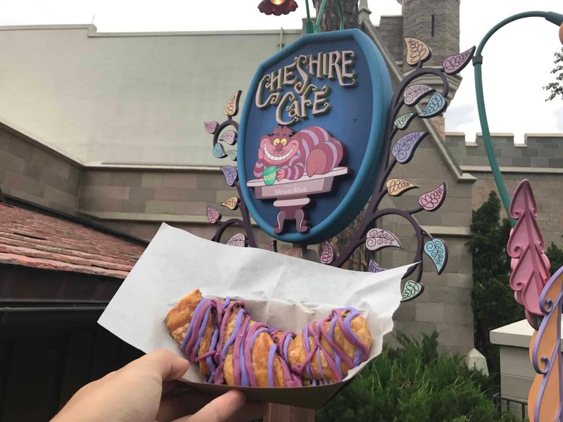 Alice in Wonderland → Cheshire Café (Magic Kingdom, near Mad Tea Party)