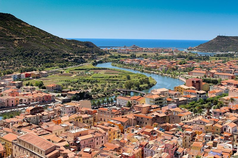 Bosa, Sardinia — pastel riverside rising to Malaspina Castle