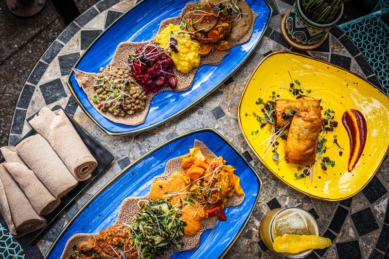 RAS Plant Based (Crown Heights) – Bright, modern Ethiopian flavors—kitfo, shiro, and veggie platters—done fully plant-based with serious spice cred