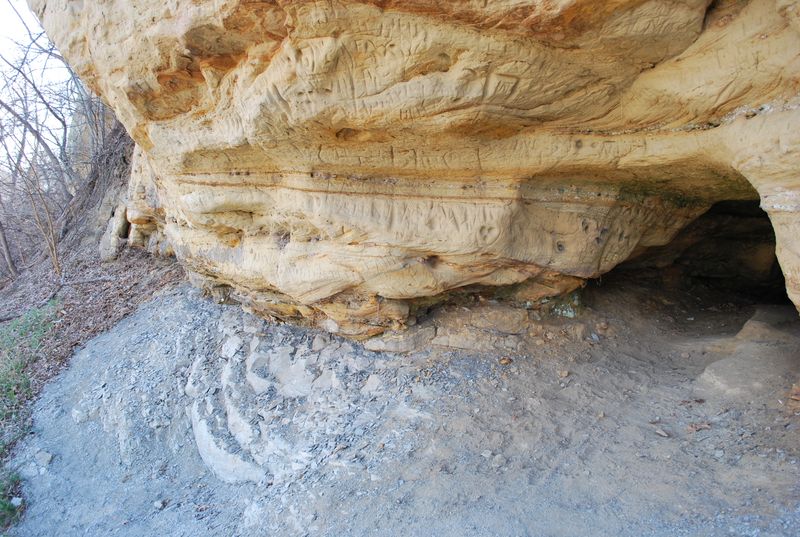 A Giant Sandstone Cave with Prehistoric Petroglyphs