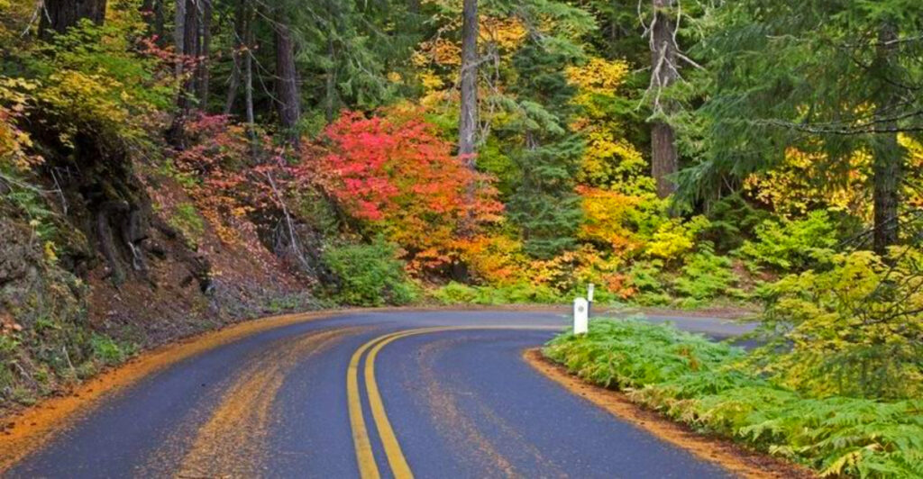 Oregon’s Stunning 82-Mile Scenic Drive Winds Past Waterfalls, Lava Fields, Mountain Peaks, and Brilliant Fall Colors