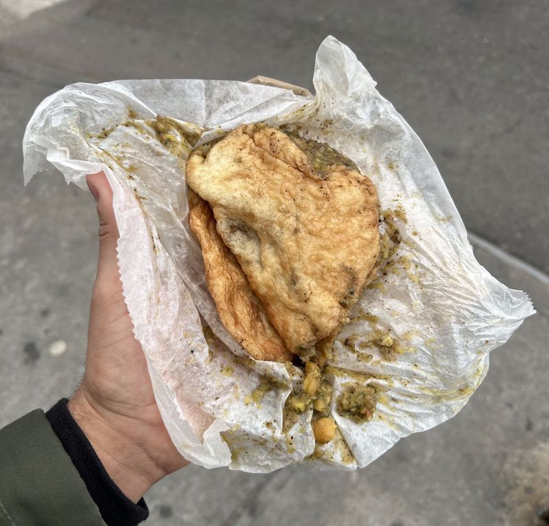 A&A Bake & Doubles (Bed-Stuy) – A tiny counter serving Trinidadian doubles, bakes, and roti—cheap, fast, and gloriously messy