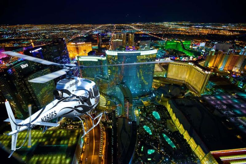 Take a nighttime helicopter flight over the Strip