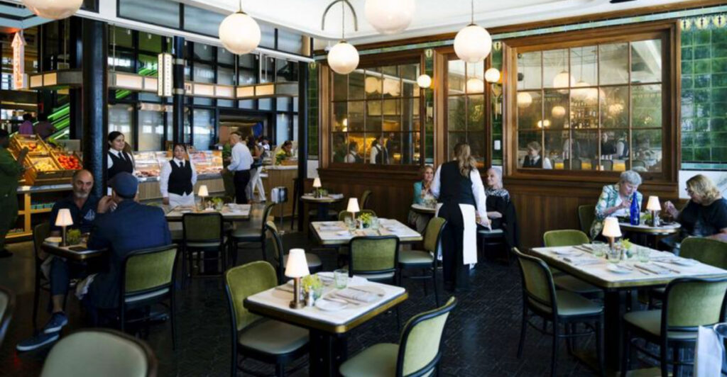 Step Inside NYC’s Historic Tin Building Food Hall With Restaurants and Bars