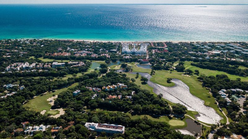 Base yourself in Playacar (gated, walkable)