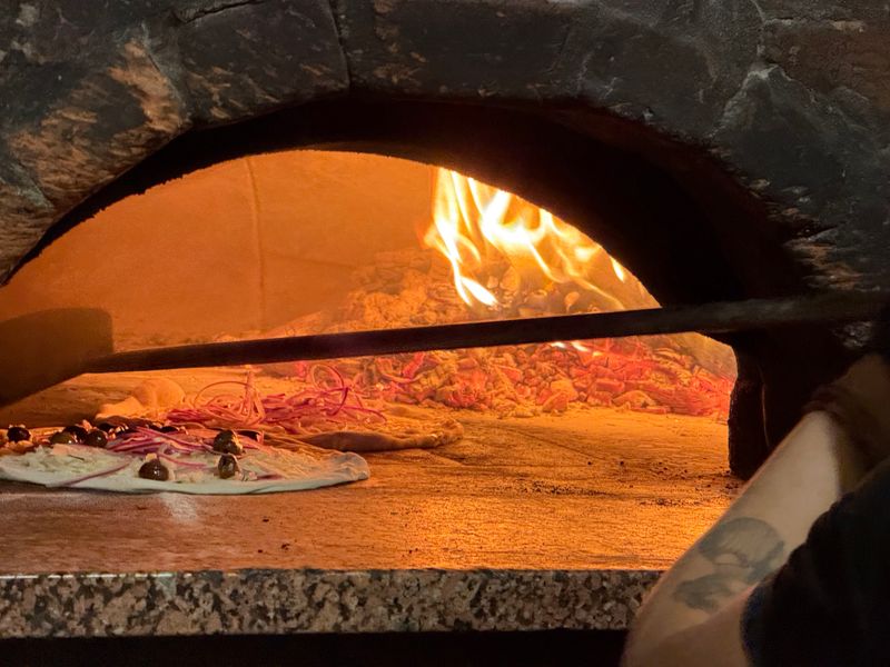 The Wood-Fired Oven Is the Heart of It All