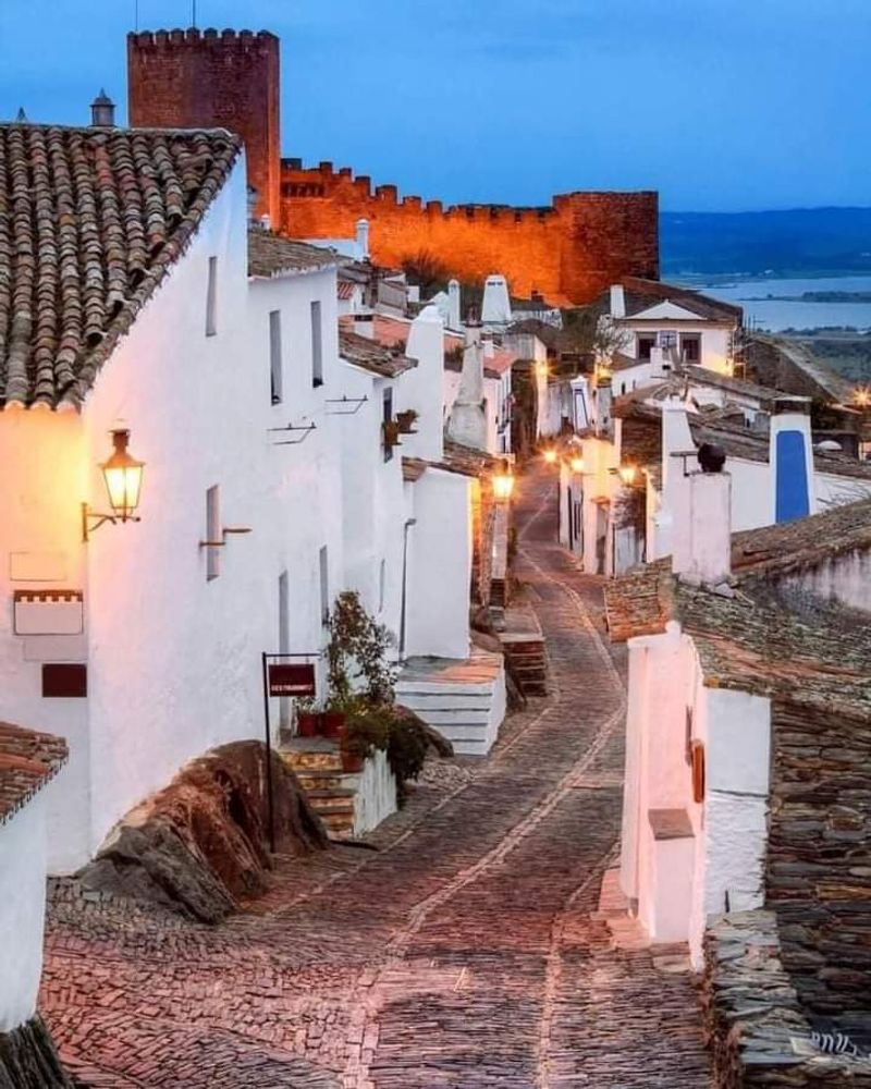 Monsaraz, Portugal (Alentejo) - whitewashed walls over a sapphire lake