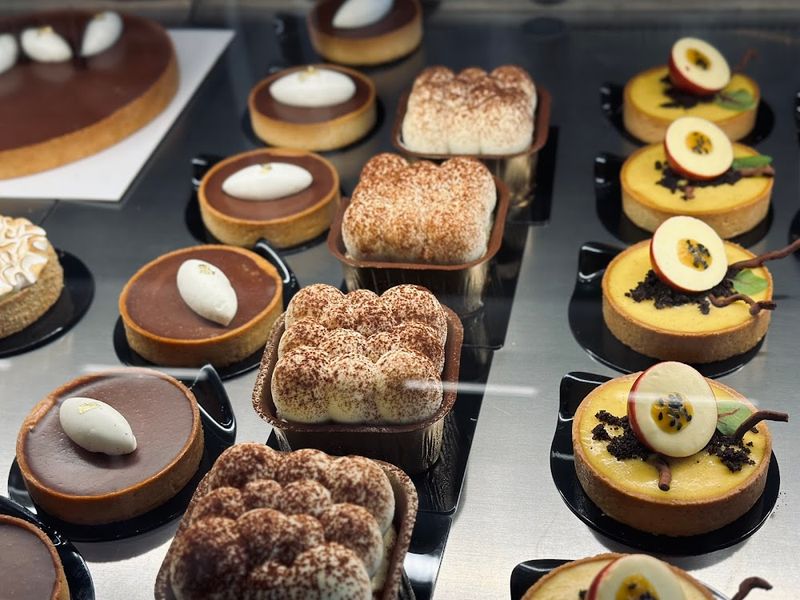 Salt Patisserie (Newton Centre) - Refined cake slices in rotation