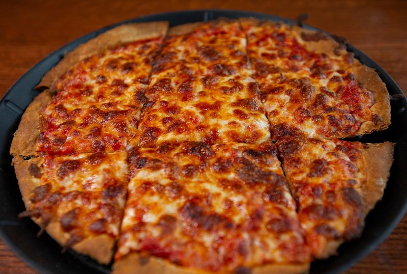 Candlelite (Rogers Park + Lincoln Park) – neon-lit legend, now with a second home