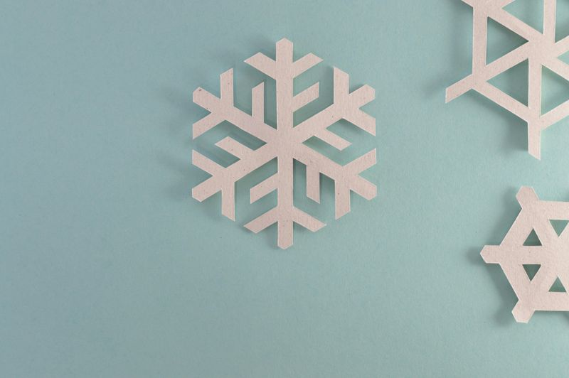 Hand-Cut Paper Snowflakes (Victorian Era)