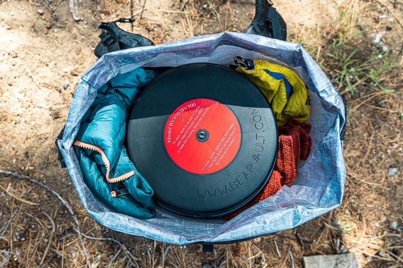 Bear canister or approved hard-sided storage (where required)