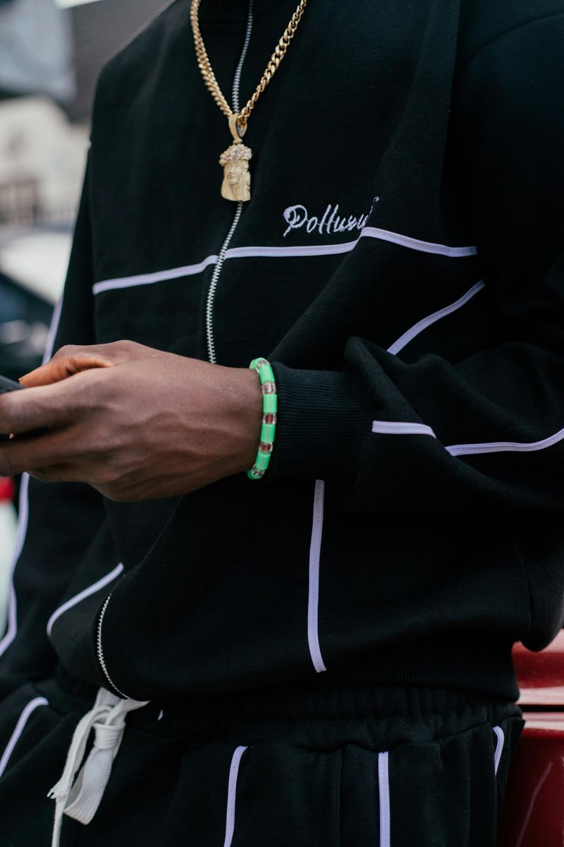 Gold chains & medallions over open shirts