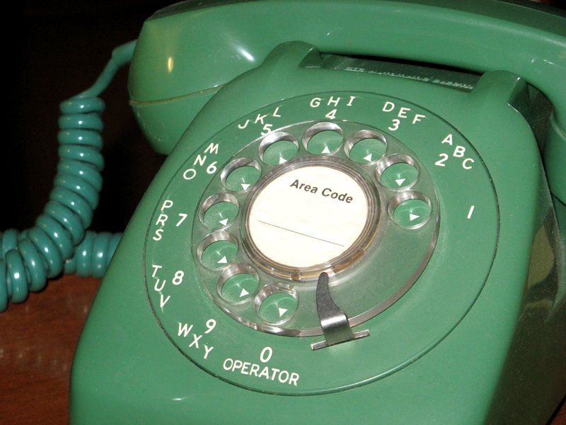 A rotary phone clicking back into place