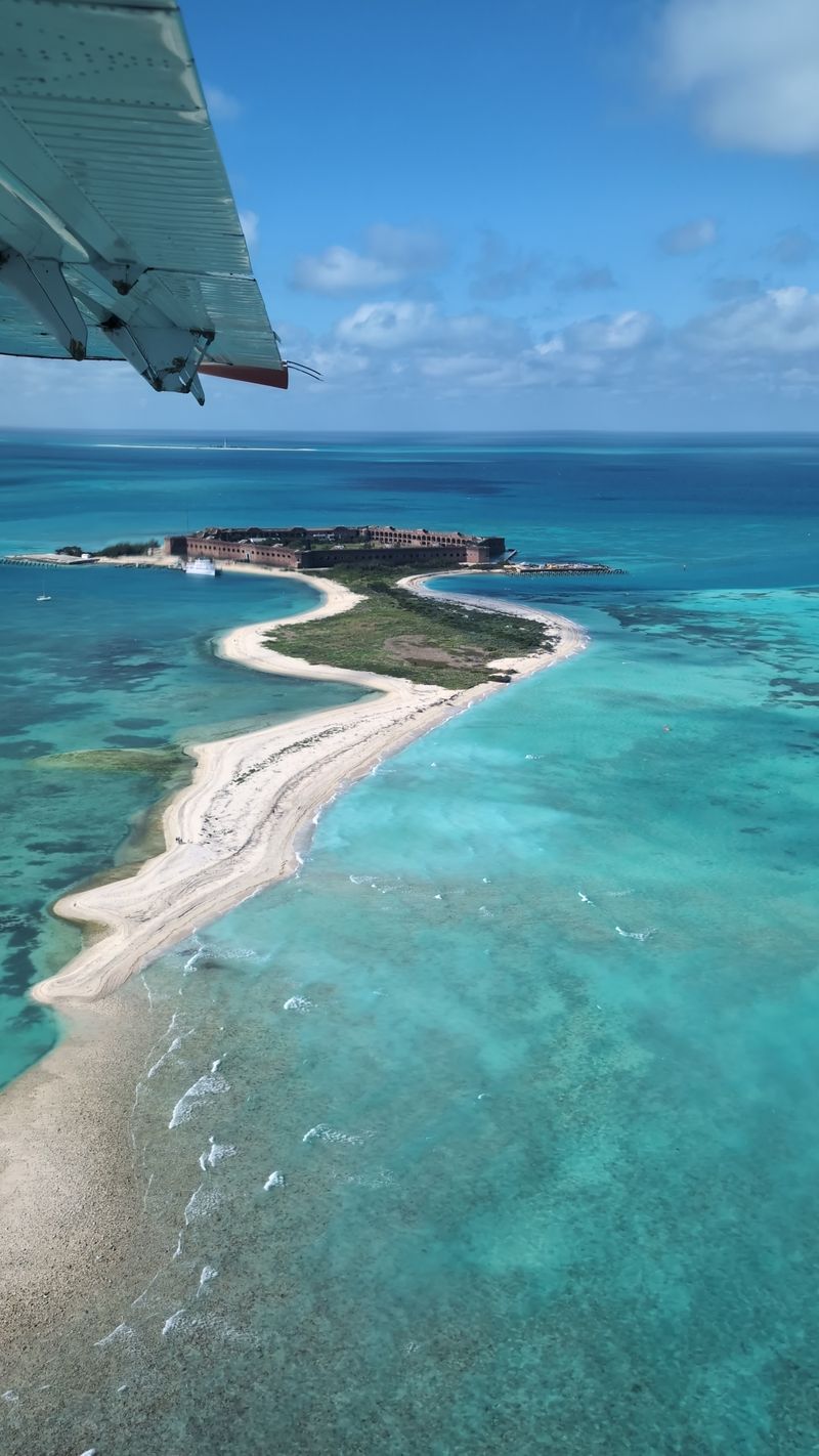 Seaplane Arrival Over Reefs