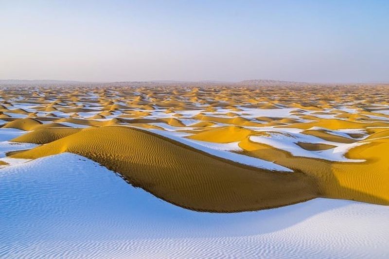 Frozen Ripples and Aeolian Art