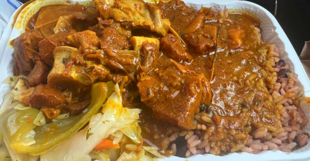 Harlem Hidden Gem Serves Curry Goat That Falls Right Off the Bone