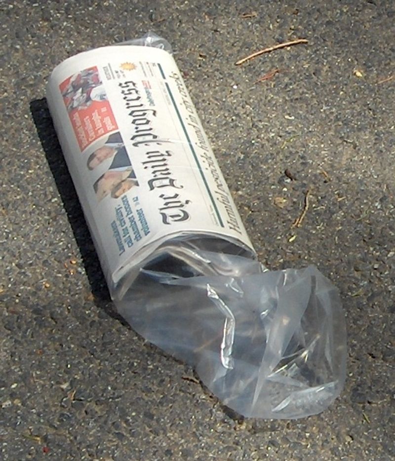 Local Newspaper Delivery by Kids on Bicycles