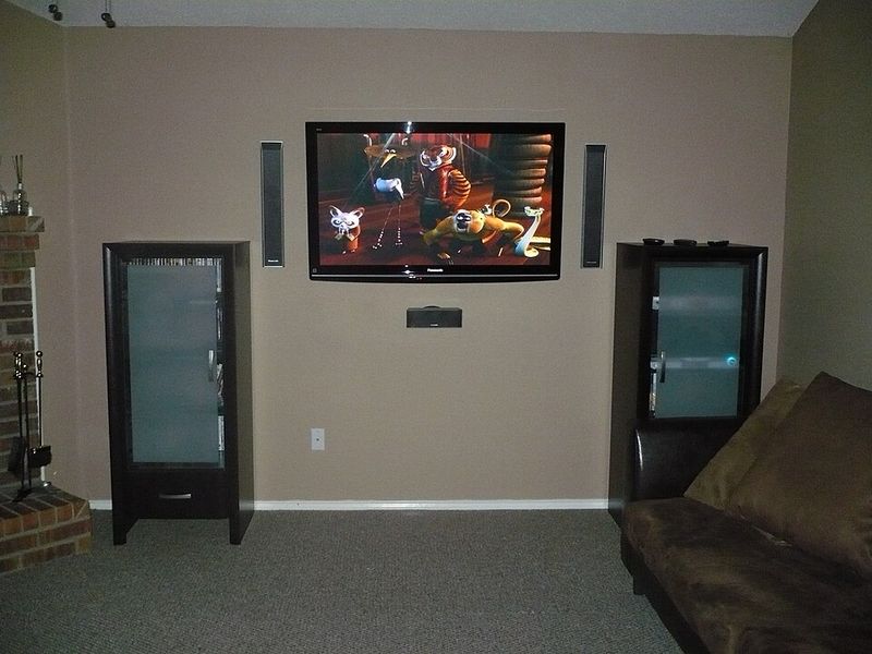 Wall-Mounted TVs With Bare Walls and Hidden Cables