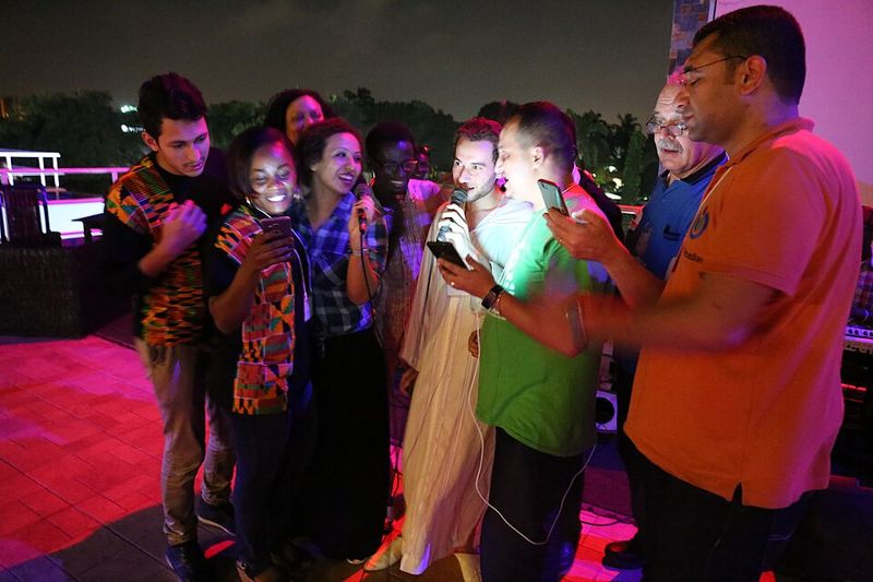 Late-night karaoke queues