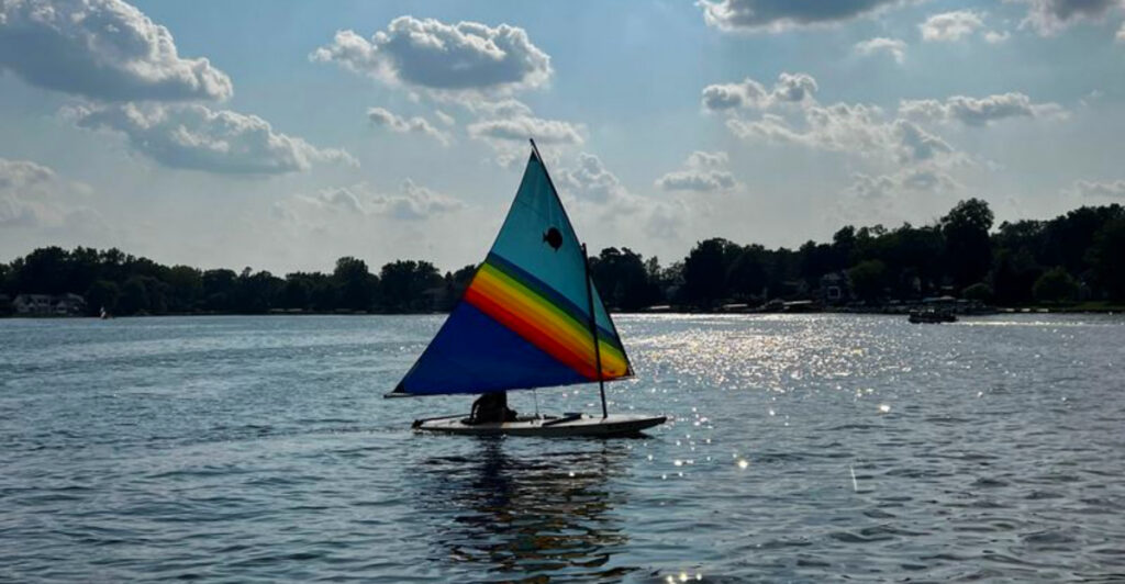 Tucked Near Lansing Is a Peaceful Michigan Lake With Clear Water and Sandy Beaches
