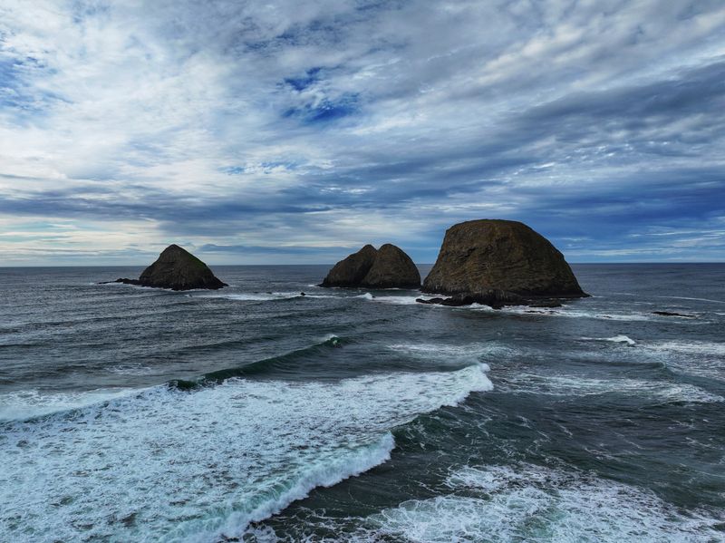 Three Arch Rocks Dominate the Horizon