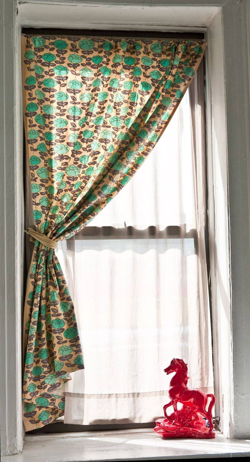 Heavy drapes or patterned curtains that blocked out light