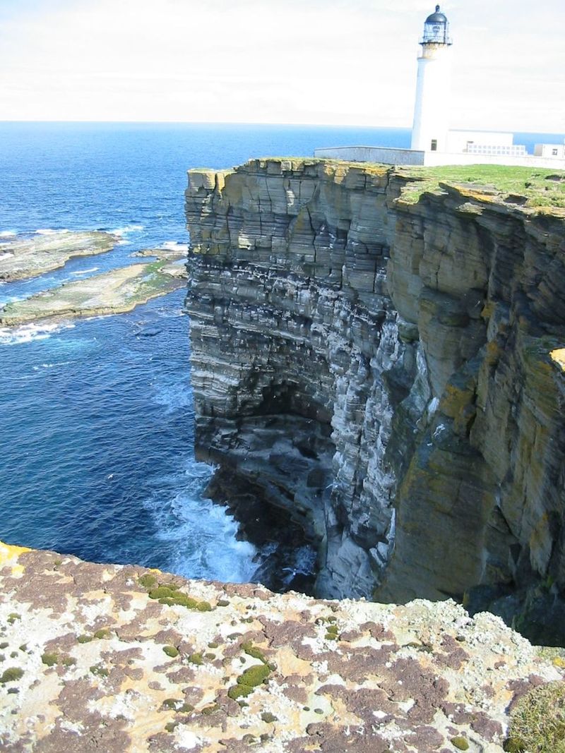 Go to Noup Head for lighthouse views and seabird cliffs
