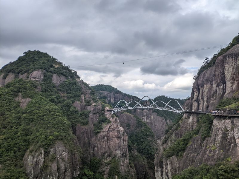 It's located in Shenxianju Scenic Area, Zhejiang Province (near Taizhou)