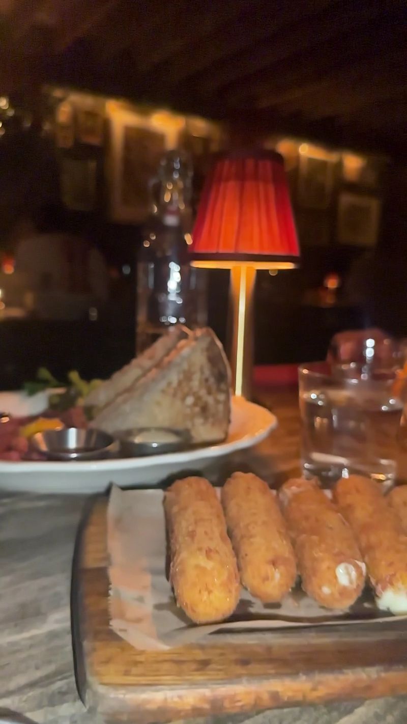 Truffle Mozzarella Sticks With Bright Red Sauce