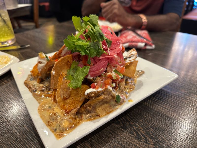 Signature Trash Can Nachos Experience