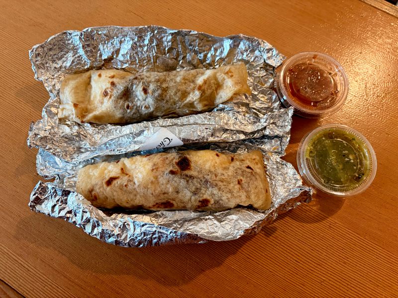 Chorizo taco with a cortado