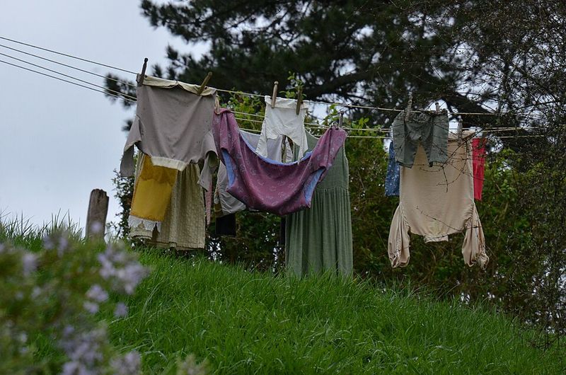 Hanging laundry outside on a clothesline