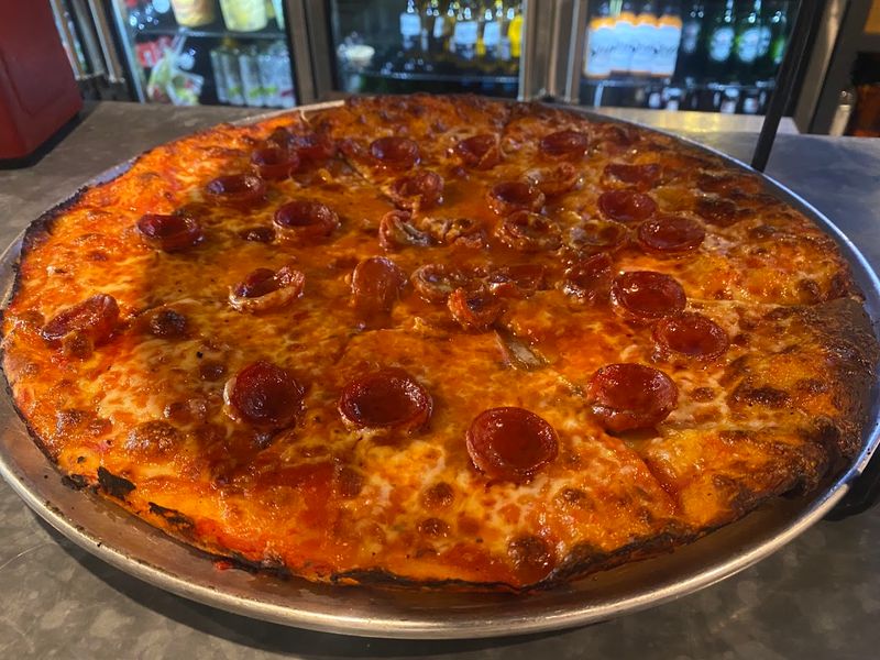 What Ultra-Thin Crust Actually Means Here