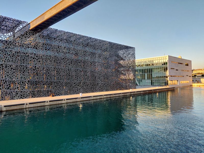 Walk the waterfront promenade from MuCEM toward the coast