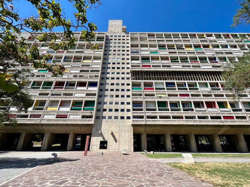 Visit La Cité Radieuse (Le Corbusier) for architecture that feels like a concept-city