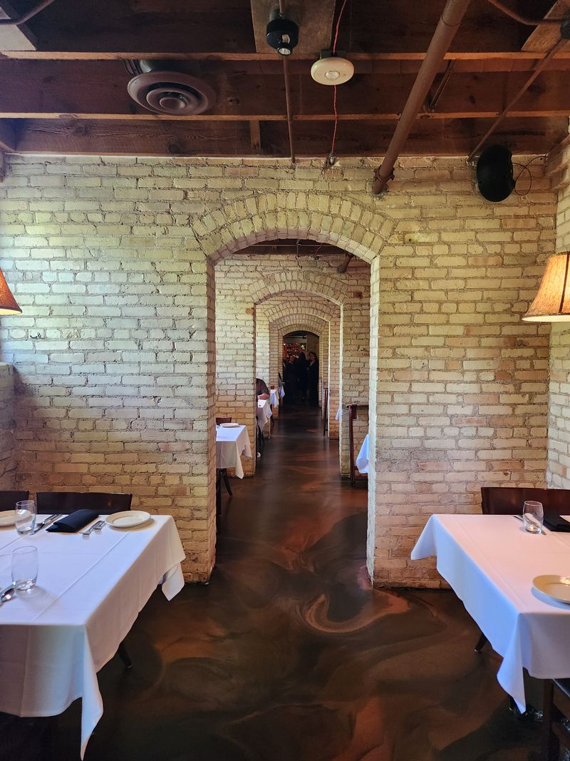 The Room: Brick, Arches, and Soft Lamps