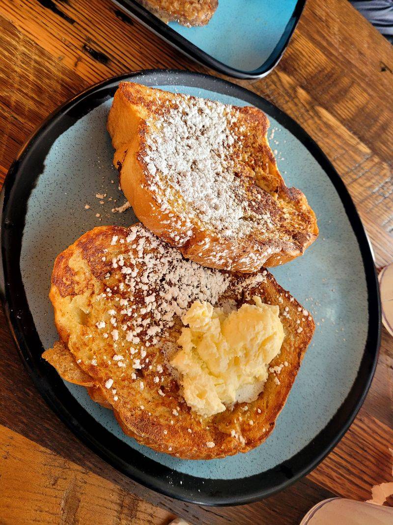 Hand-Churned Butter Spread on Warm Bread